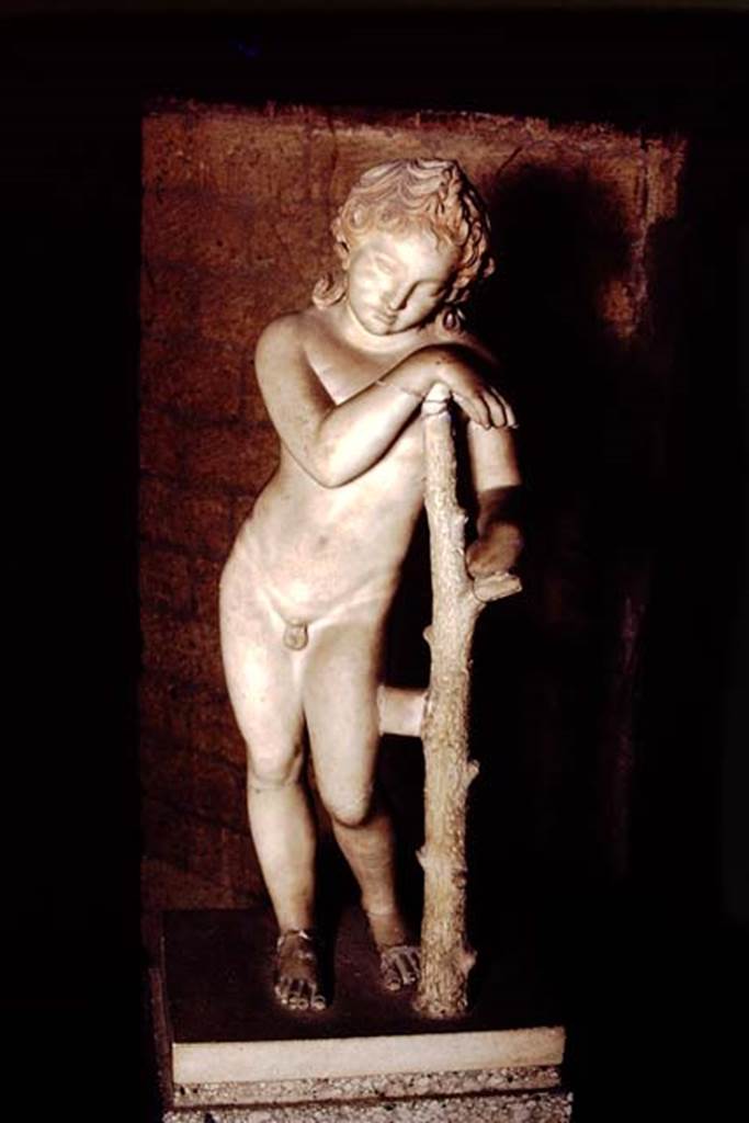 Herculaneum, 1978. One of the sleeping funerary statues form the top of the memorial altar of Marcus Nonius Balbus.  Photo by Stanley A. Jashemski.   
Source: The Wilhelmina and Stanley A. Jashemski archive in the University of Maryland Library, Special Collections (See collection page) and made available under the Creative Commons Attribution-Non Commercial License v.4. See Licence and use details. J78f0504